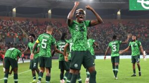 Super Eagles Victor Osimhen celebrating with teammates during their match against Cameroon. Nigeria won 2-0 to book a place for the quarter final in the 2024 African cup of Nations 