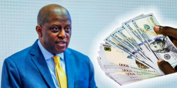 CBN sells dollars to BDCs at N1,021/$ wad of dollar bills and naira notes