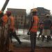 Construction workers threaten strike over sack of 30,000 workers