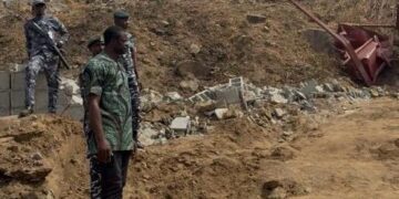 FHA Boss Use Dozen Armed Policemen to Demolish Abuja Property, Allegedly Attack Lady-owner, Drag Her on the Ground