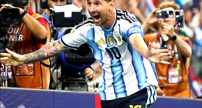Messi double sends Argentina into knockout stage